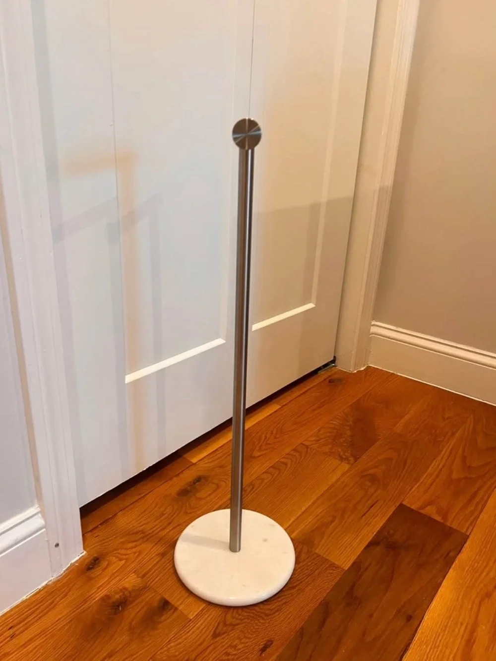 Freestanding Stainless Steel Toilet Paper Stand with White Marble Base